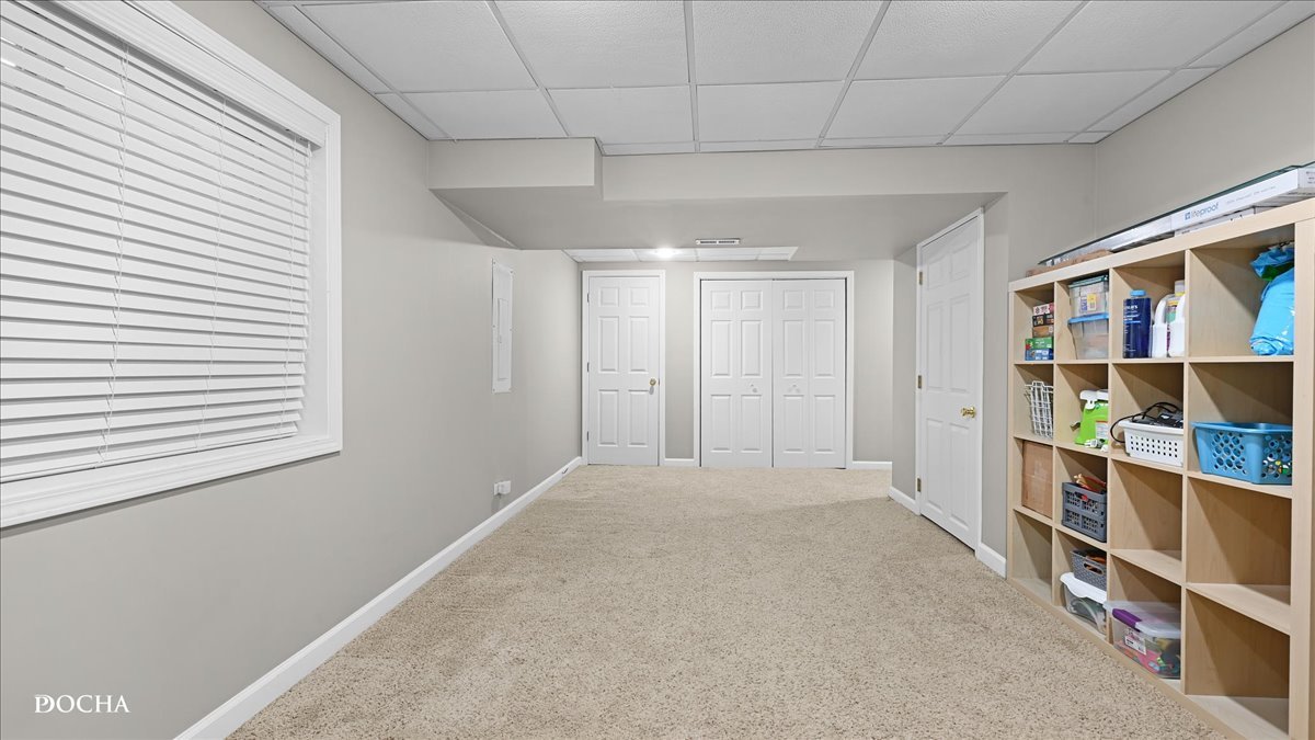 420 Raintree Drive Oswego, IL 60543 - Photo 42 of 51 a view of an empty room with shelves