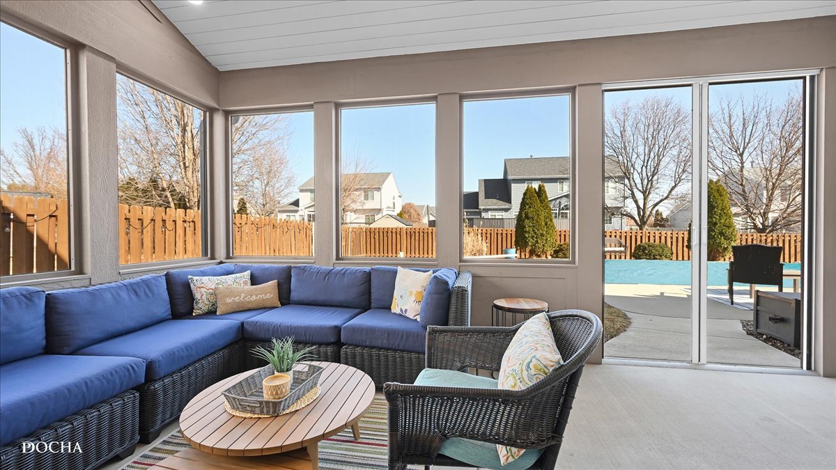 420 Raintree Drive Oswego, IL 60543 - Photo 43 of 51 a living room with furniture and a large window