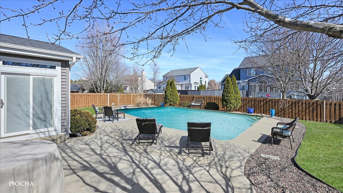 420 Raintree Drive Oswego, IL 60543 - Photo 45 of 51 a view of a patio with couches chairs and a fire pit