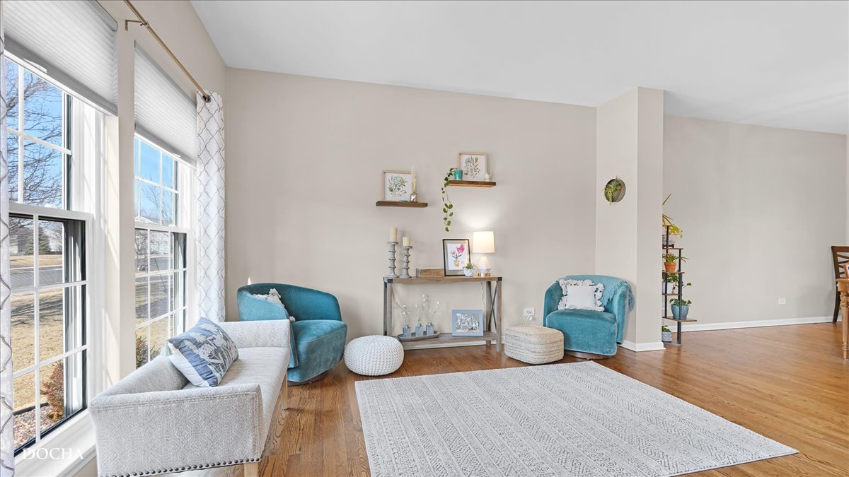 420 Raintree Drive Oswego, IL 60543 - Photo 5 of 51 a living room with furniture and wooden floor