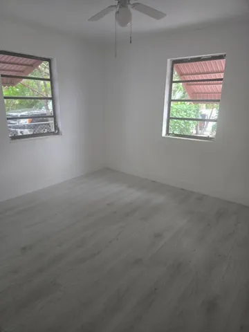 an empty room with windows
