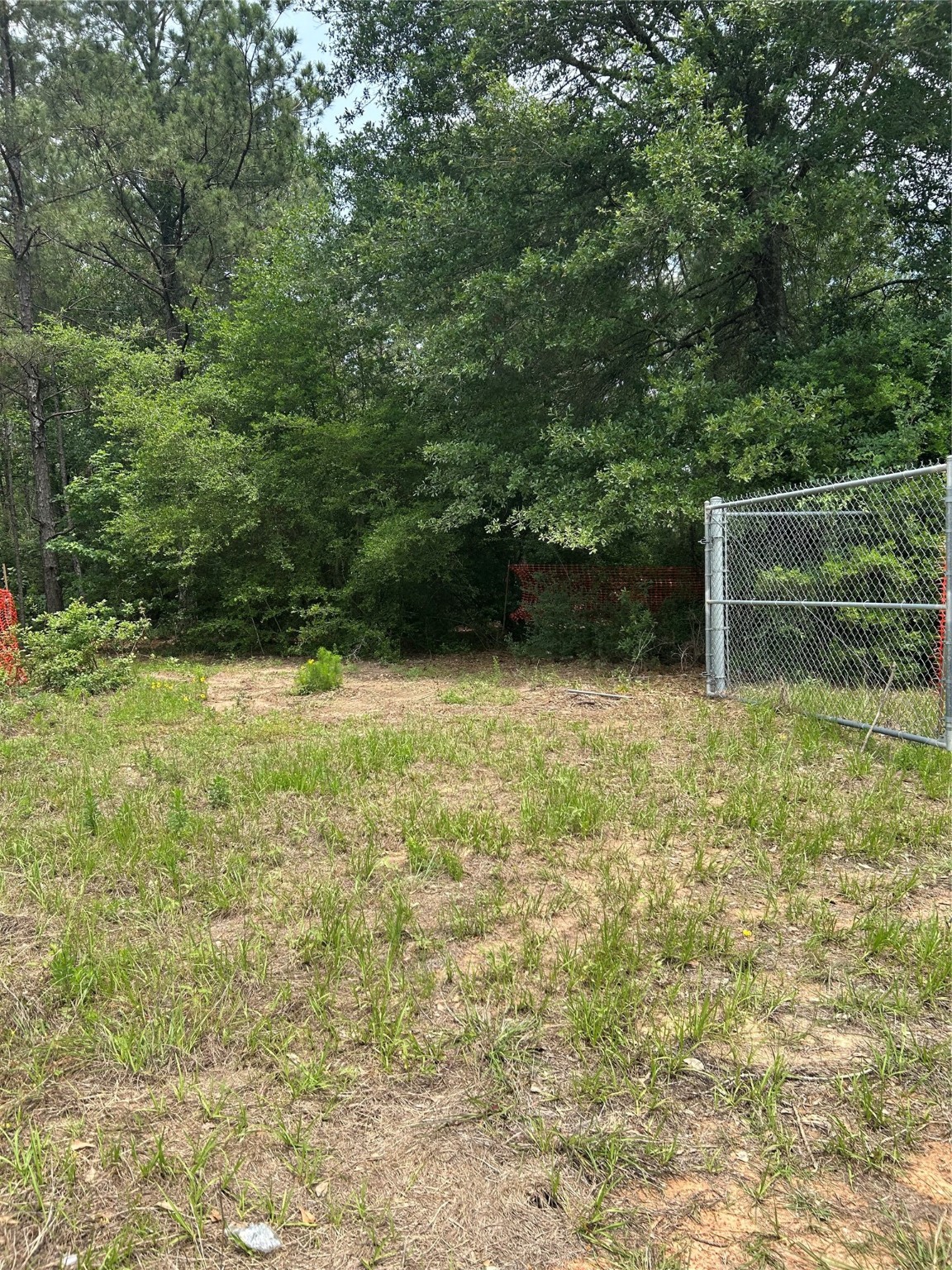 3300 South Loop 336 East Conroe, TX 77301 - Photo 3 of 3 a view of outdoor space with deck and yard