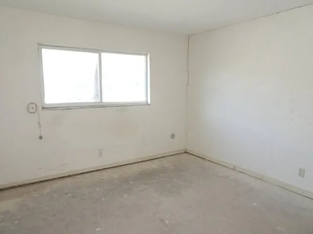 an empty room with a window