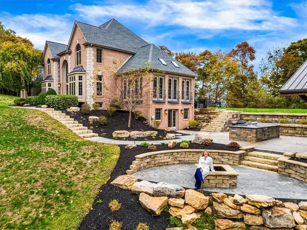 a front view of a house with swimming pool