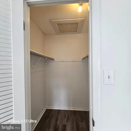 a view of small space with racks on the wall