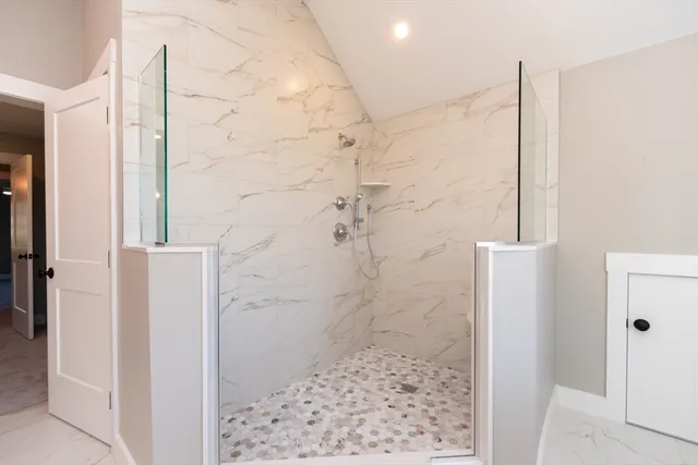 a bathroom with a sink double vanity and a mirror