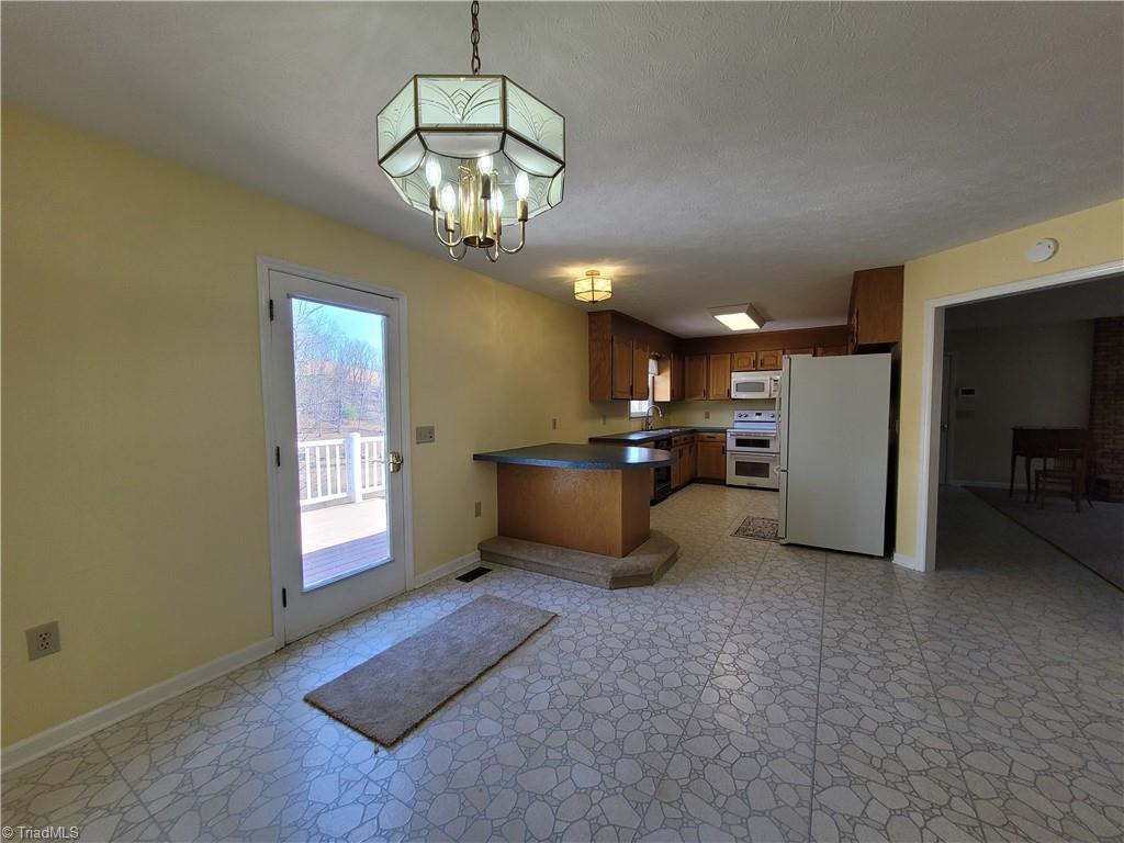 730 Blue Hollow Road Mount Airy, NC 27030 - Photo 15 of 35 Dining area facing kitchen