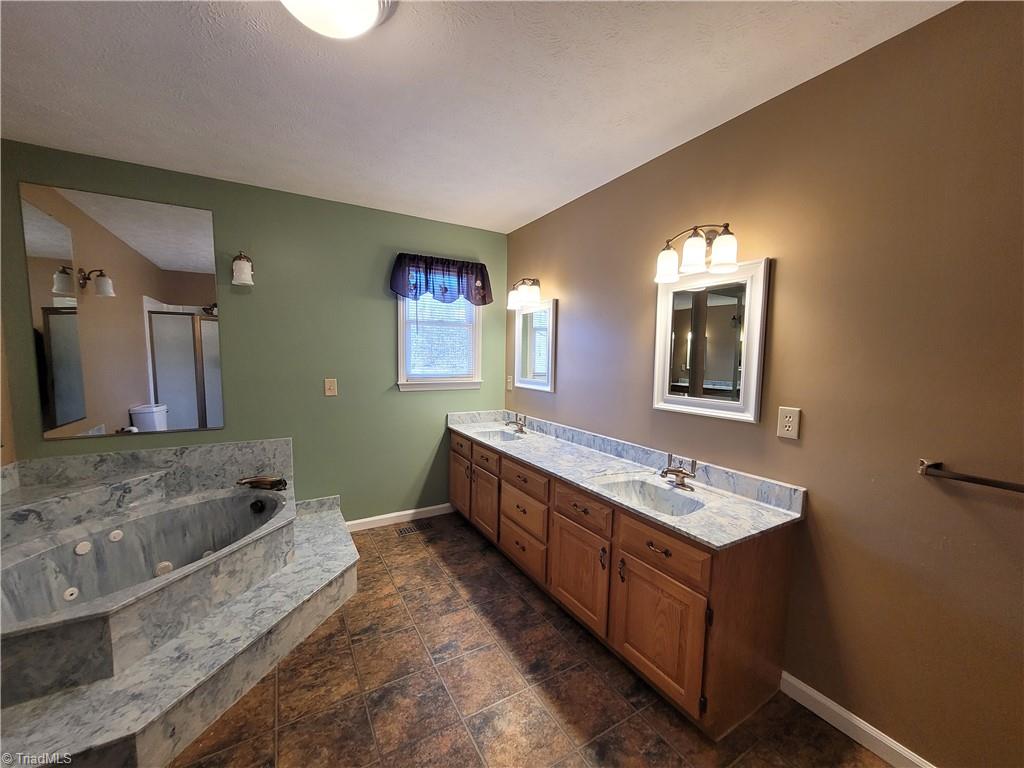 730 Blue Hollow Road Mount Airy, NC 27030 - Photo 23 of 35 Main Bathroom with jetted tub
