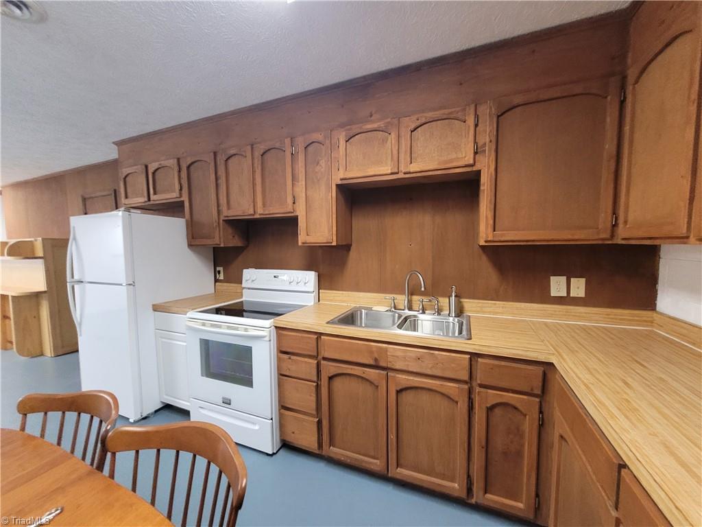 730 Blue Hollow Road Mount Airy, NC 27030 - Photo 29 of 35 Basement Kitchen