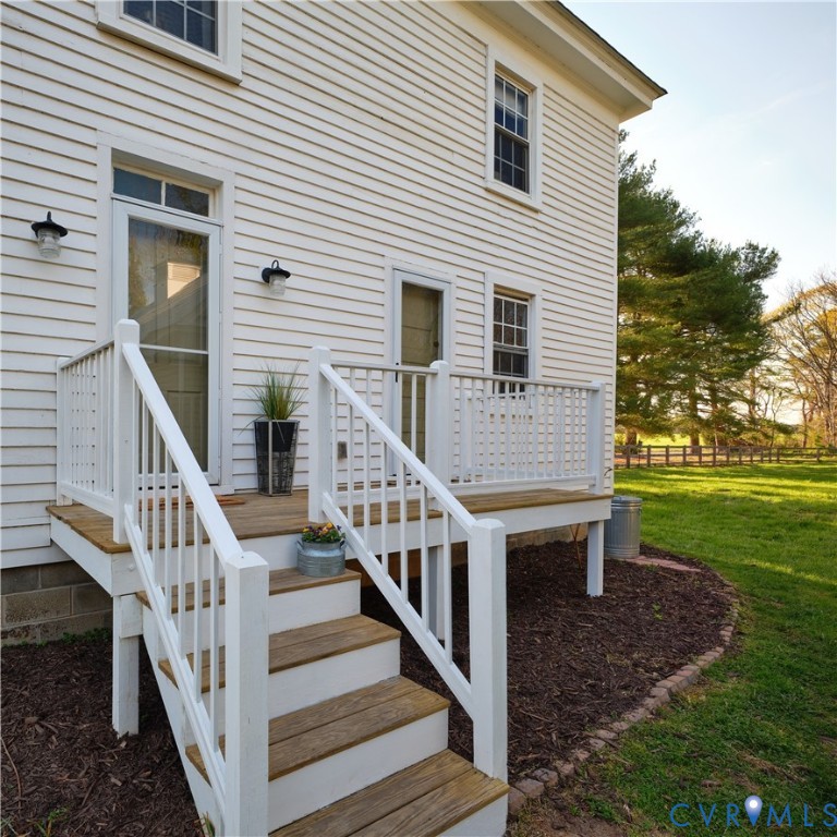 4970 Mt Landing Road Tappahannock, VA 22560 - Photo 32 of 48 a view of a house with backyard and trees