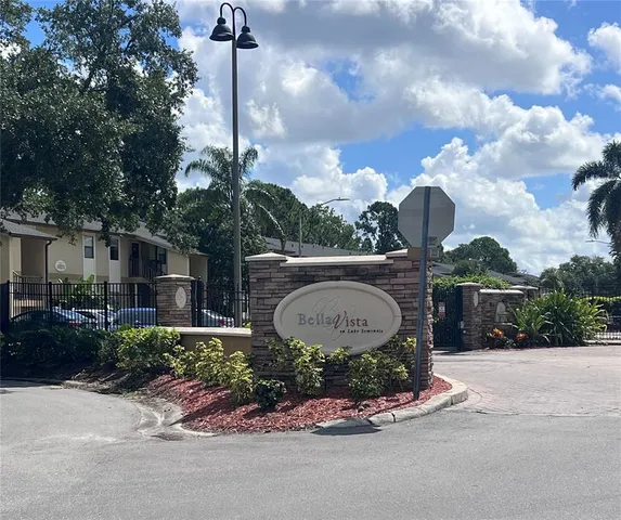 a kitchen with a refrigerator sink and microwave