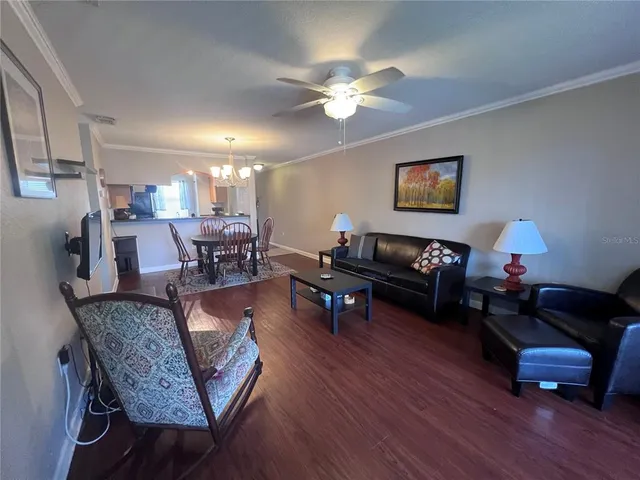 a view of a balcony with furniture