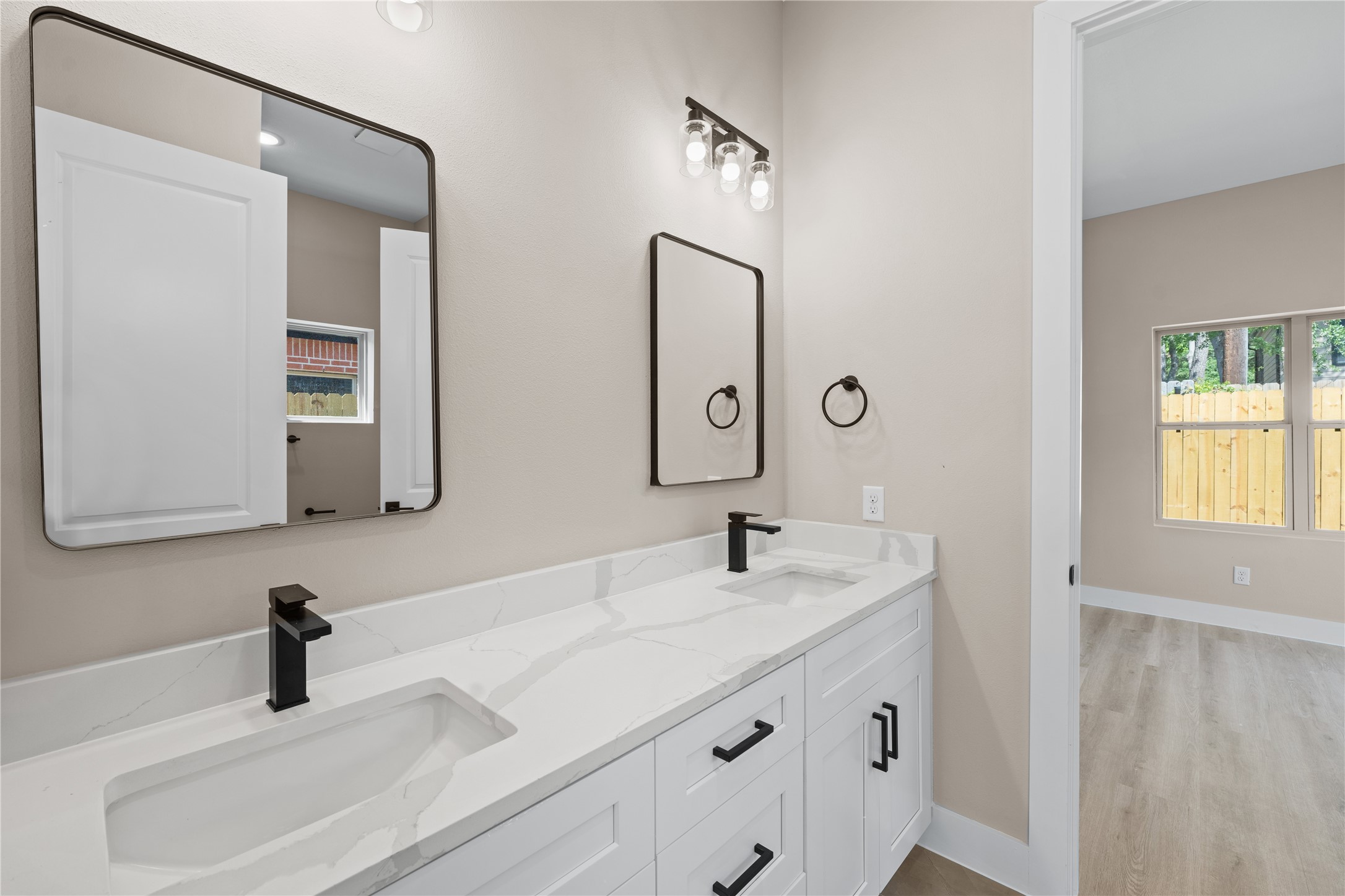 2610 Piemonte Ave Spring Spring, TX 77388 - Photo 13 of 23 a bathroom with a sink and a mirror