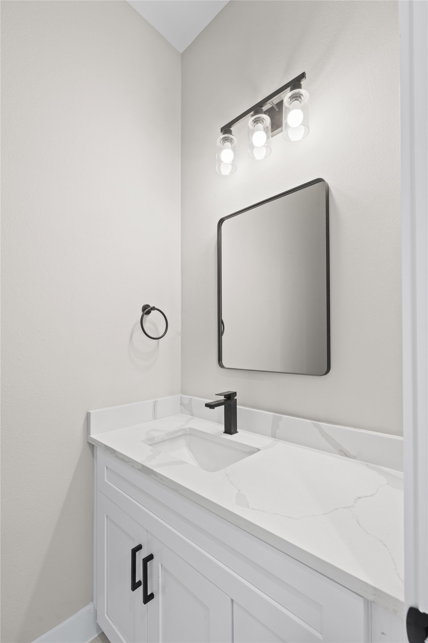 2610 Piemonte Ave Spring Spring, TX 77388 - Photo 4 of 23 a bathroom with a sink vanity and a mirror