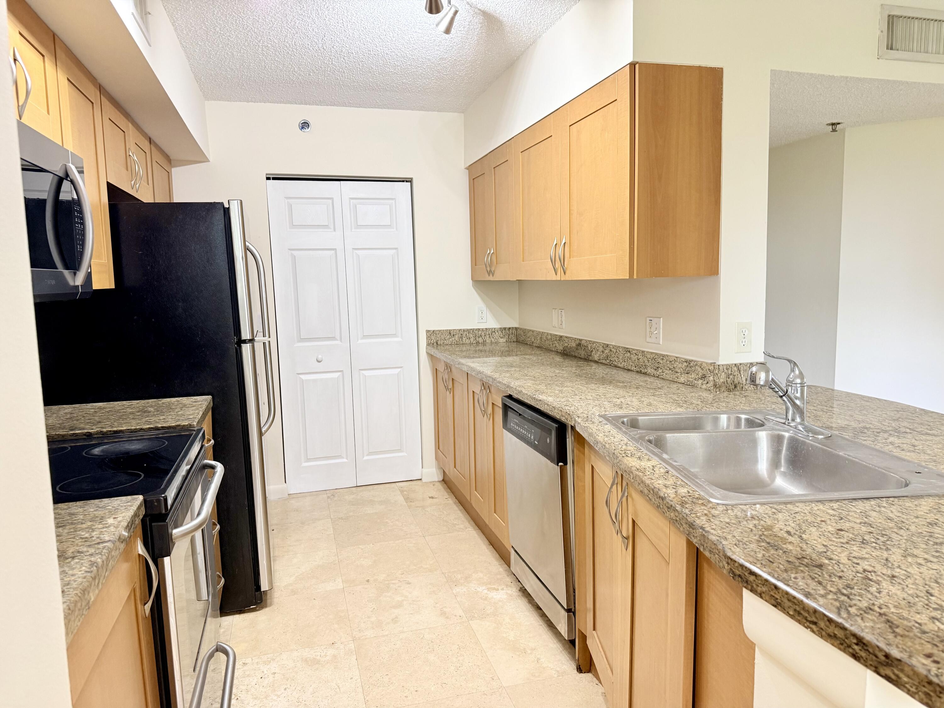 3153 Clint Moore Road, Unit 108 Boca Raton, FL 33496 - Photo 3 of 25 Kitchen