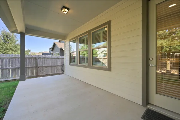 a view of backyard and tree