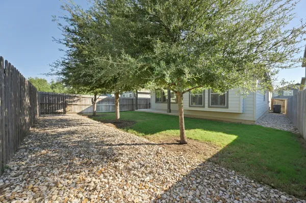 a house with trees in front of it