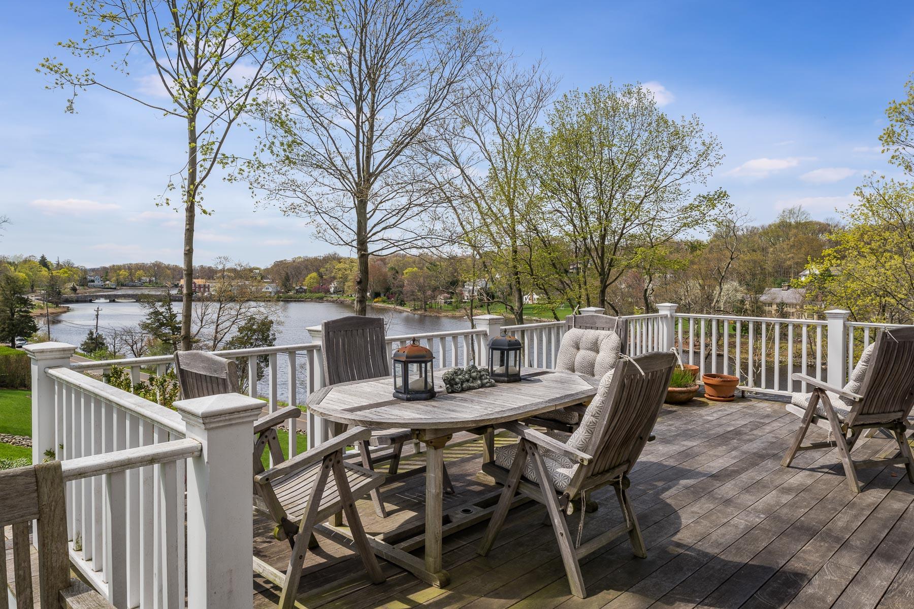 110 Goodwives River Road Darien, CT 06820 - Photo 13 of 23 a view of a chairs and table on the roof deck