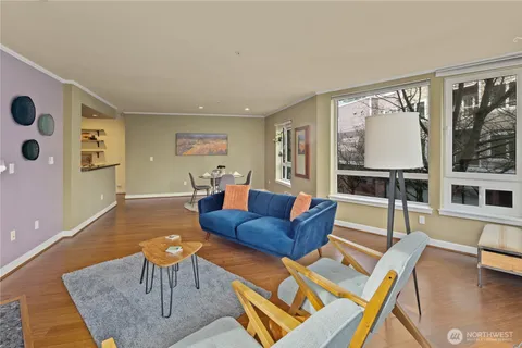 a living room with furniture and a table