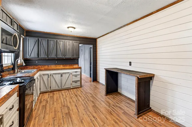 a view of kitchen from the hallway