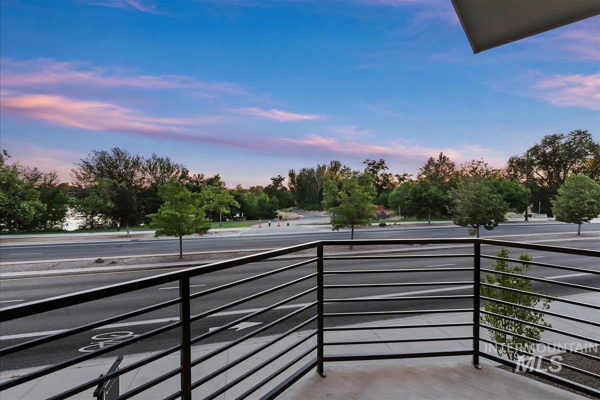 3213 West Moore Street Boise, ID 83702 - Photo 7 of 32 Balcony featuring contemporary black metal railing and concrete flooring