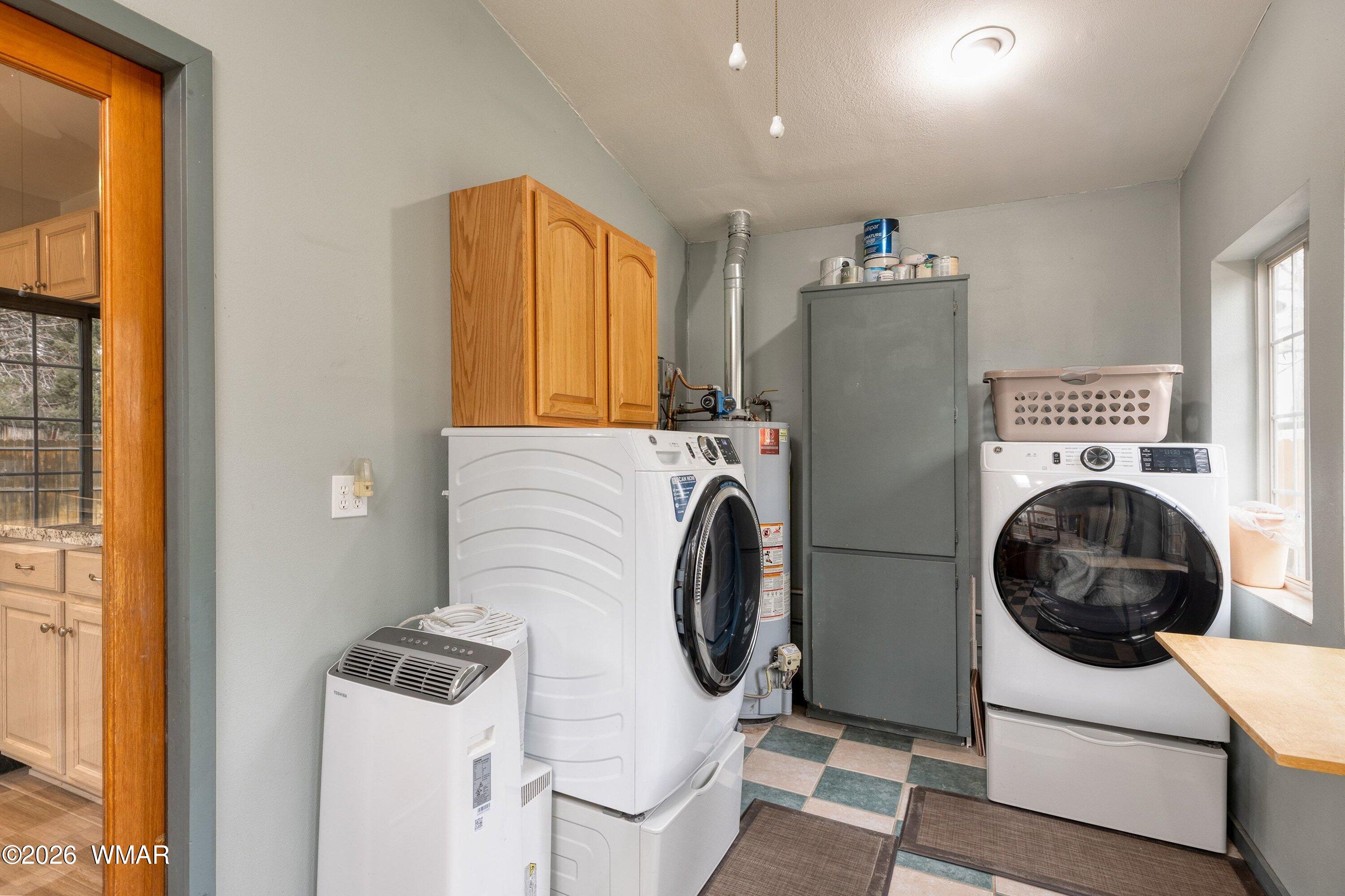 1306 West Pima Lane Lakeside, AZ 85929 - Photo 19 of 31 a utility room with dryer and washer
