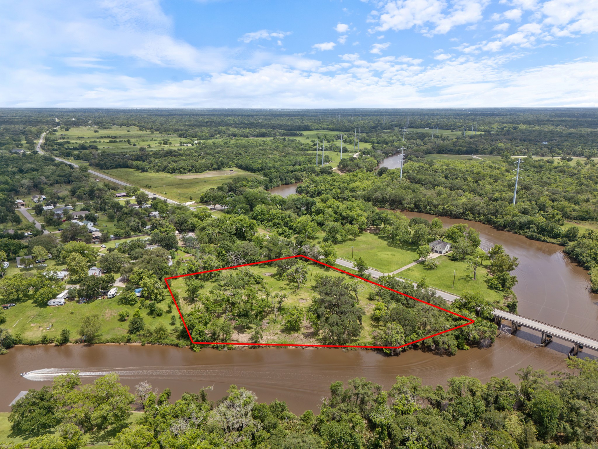 4610 FM 522 Road Brazoria, TX 77422 - Photo 10 of 18 an aerial view of residential houses with outdoor space and trees