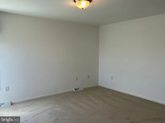 a view of a room with an empty space