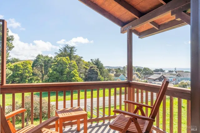 a spacious bathroom with a double vanity sink a mirror and a bathtub