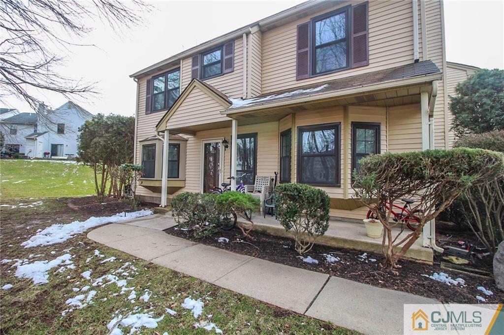 601 Maplecrest Road, Unit 601 Edison, NJ 08820 - Photo 2 of 25 a front view of a house with garden