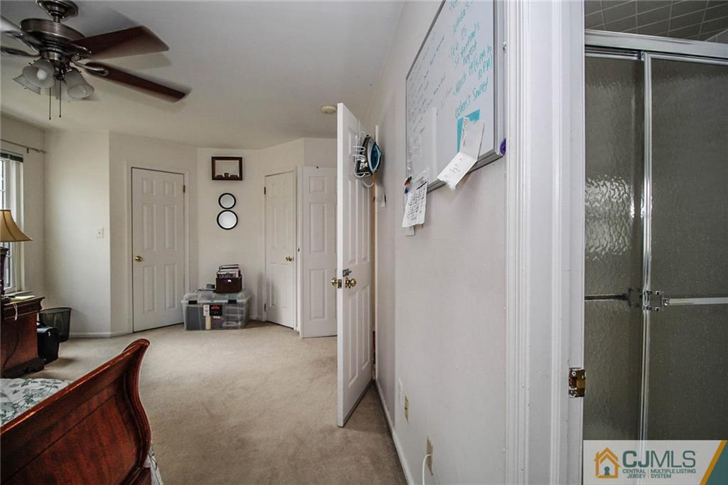 601 Maplecrest Road, Unit 601 Edison, NJ 08820 - Photo 20 of 25 a view of a room with gym equipment