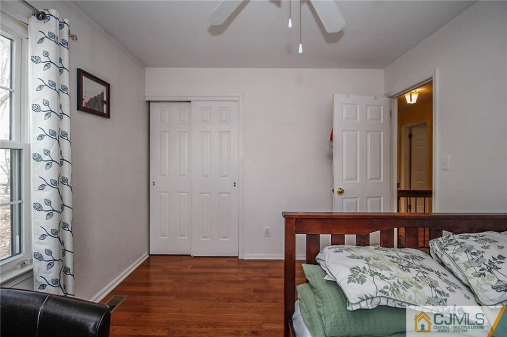 601 Maplecrest Road, Unit 601 Edison, NJ 08820 - Photo 23 of 25 a view of a bedroom with furniture and workspace