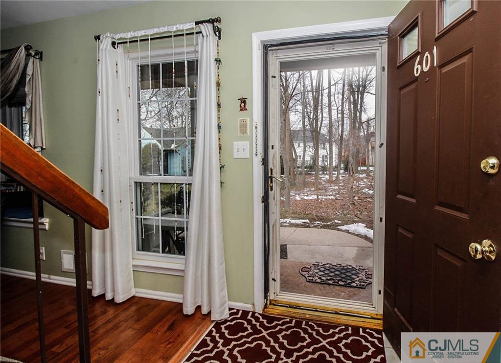 601 Maplecrest Road, Unit 601 Edison, NJ 08820 - Photo 5 of 25 a view of entryway with wooden floor