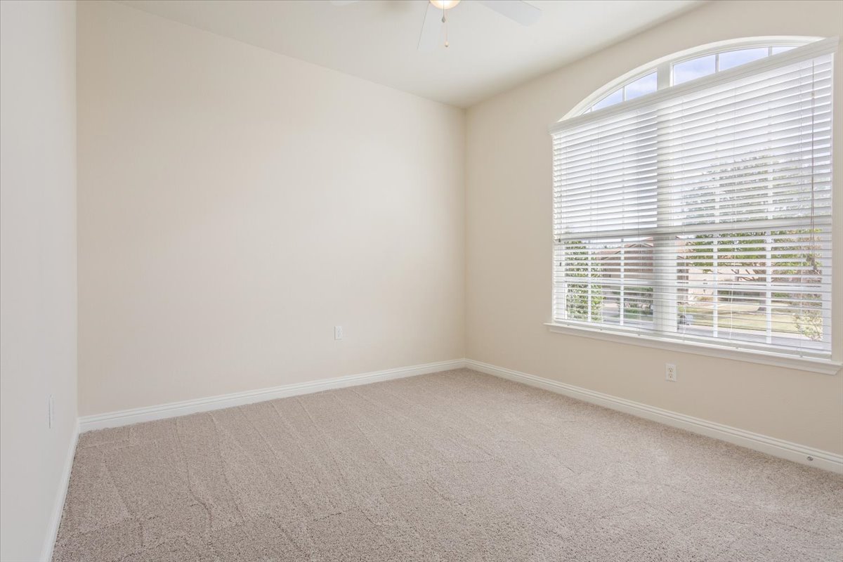 108 Cathedral Mountain Pass Georgetown, TX 78633 - Photo 25 of 36 an empty room with a window