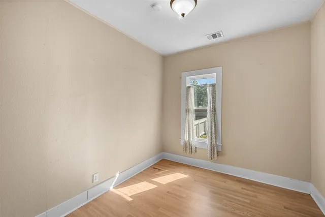 an empty room with window