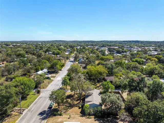 an aerial view of a city with lots of residential buildings