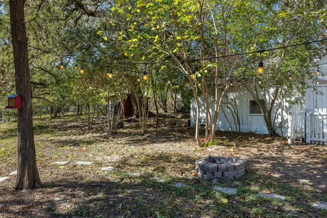 a view of backyard with green space