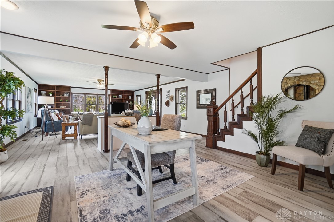 7553 Coffin Station Road Springfield, OH 45502 - Photo 36 of 95 This inviting interior features a grand staircase and durable flooring, ideal for comfortable living.