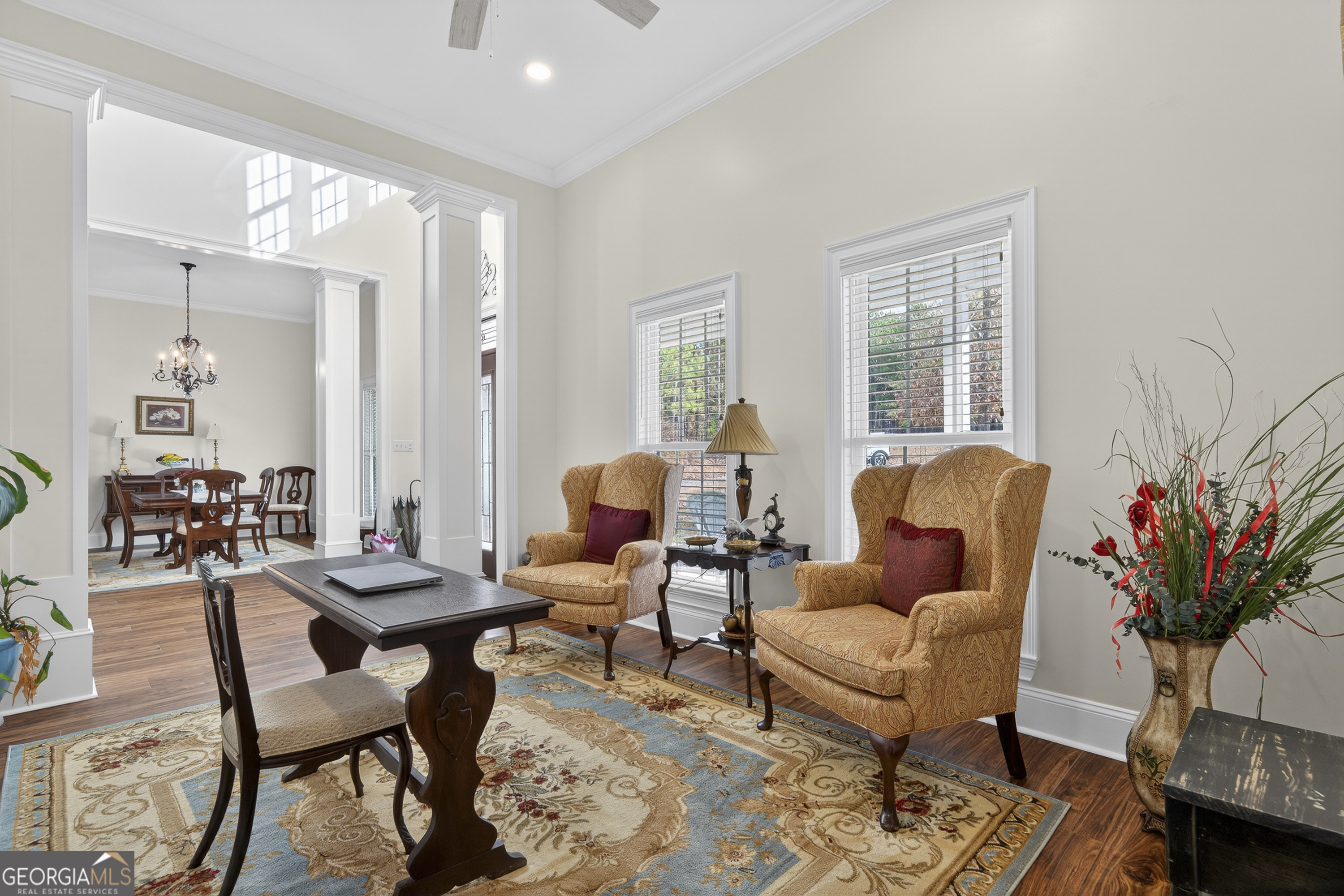 137 Butler Road Southeast Milledgeville, GA 31061 - Photo 11 of 82 a living room with furniture potted plant and a large window