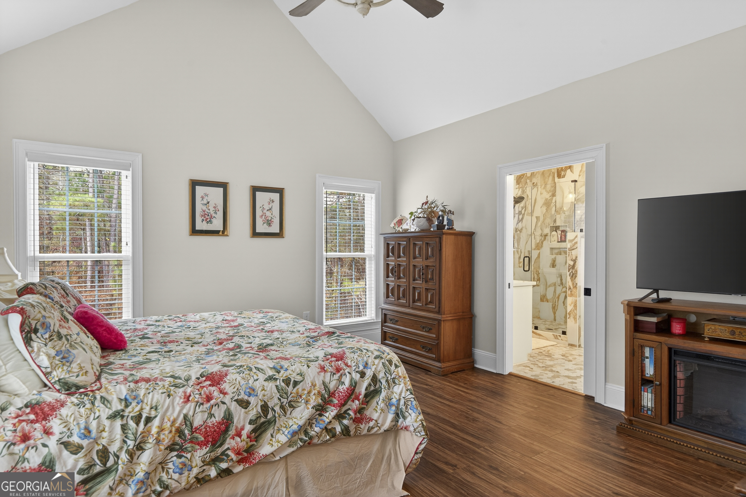 137 Butler Road Southeast Milledgeville, GA 31061 - Photo 29 of 82 a bedroom with a bed and wooden floor