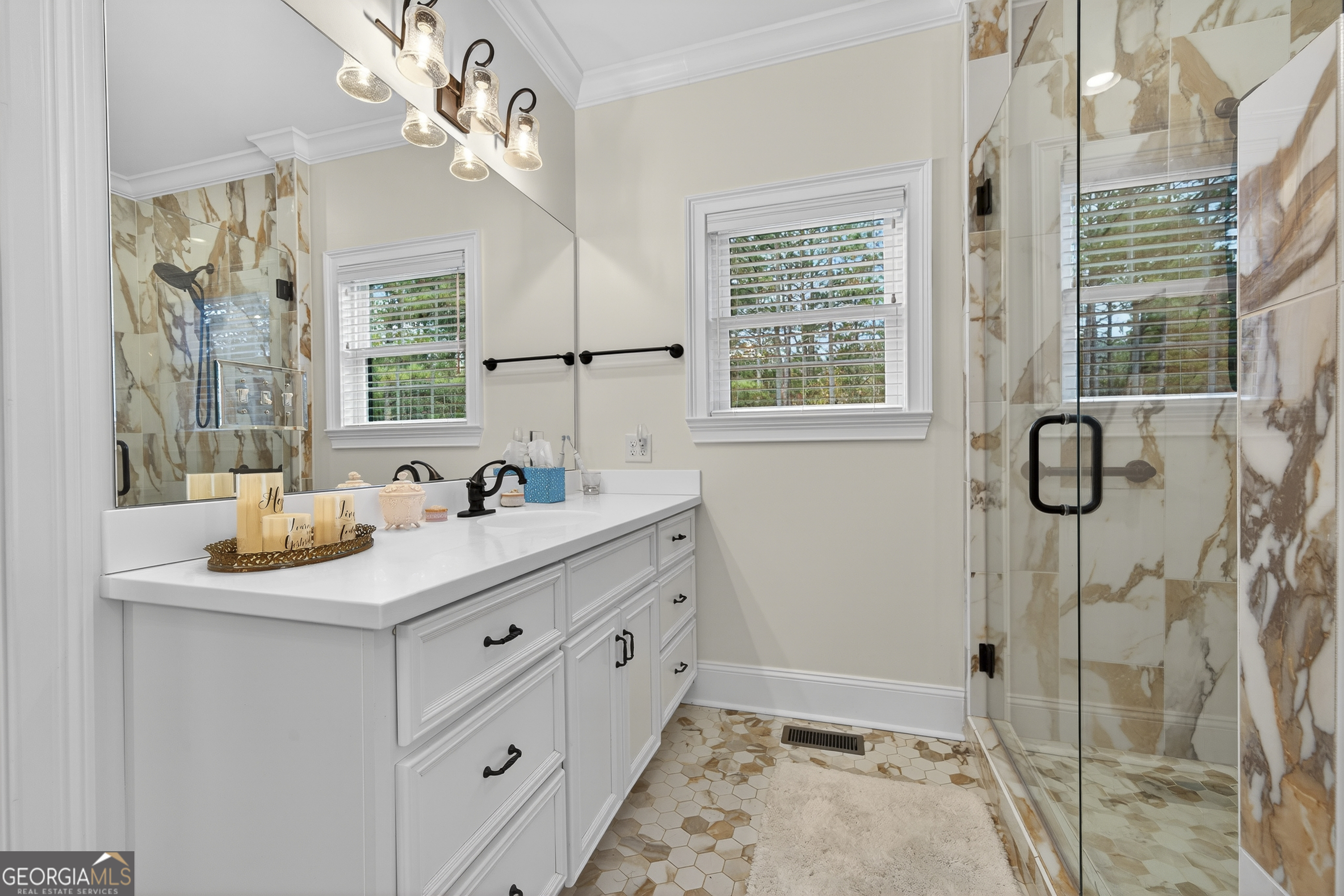 137 Butler Road Southeast Milledgeville, GA 31061 - Photo 32 of 82 a bathroom with a sink and a mirror