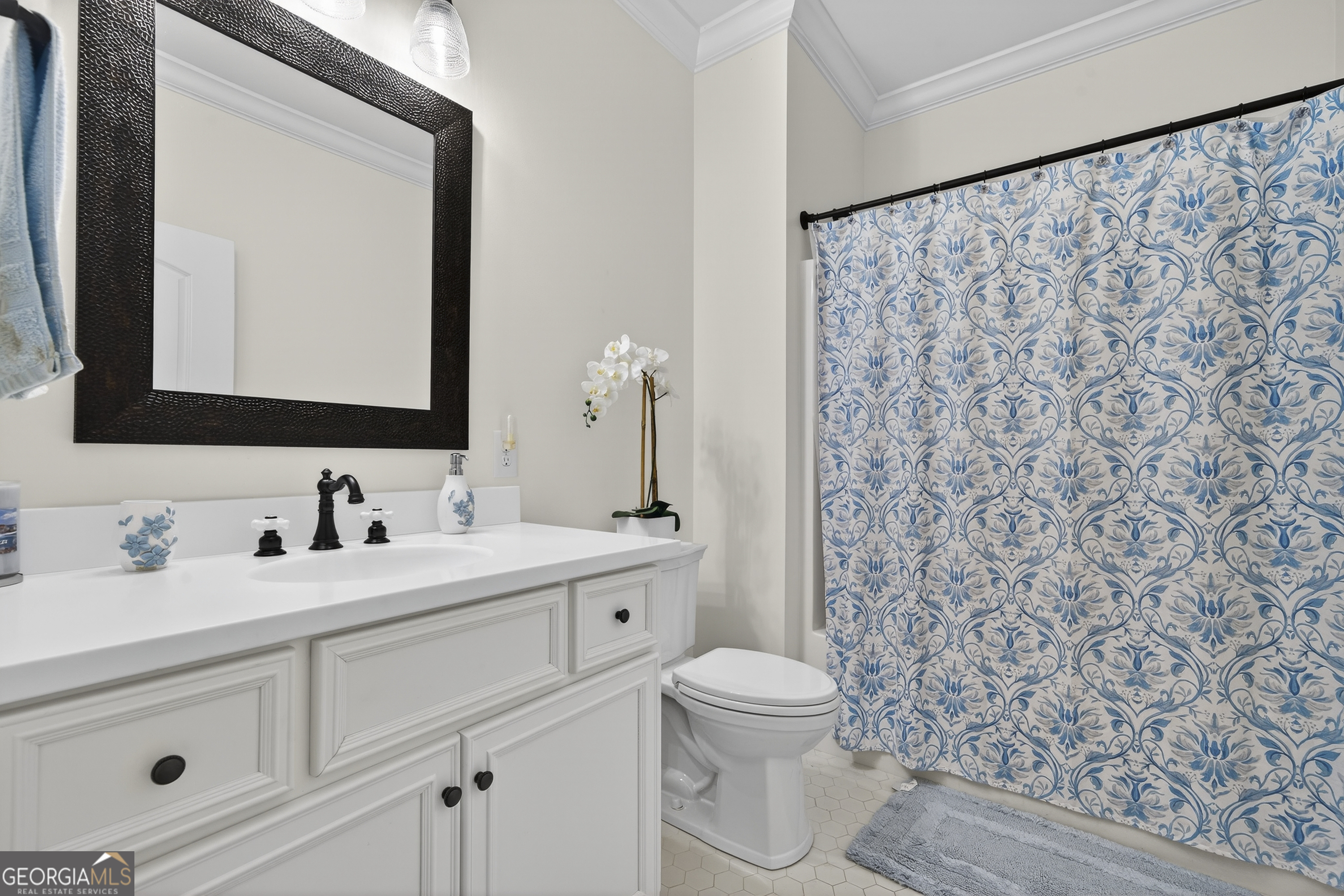 137 Butler Road Southeast Milledgeville, GA 31061 - Photo 44 of 82 a bathroom with a toilet sink and mirror