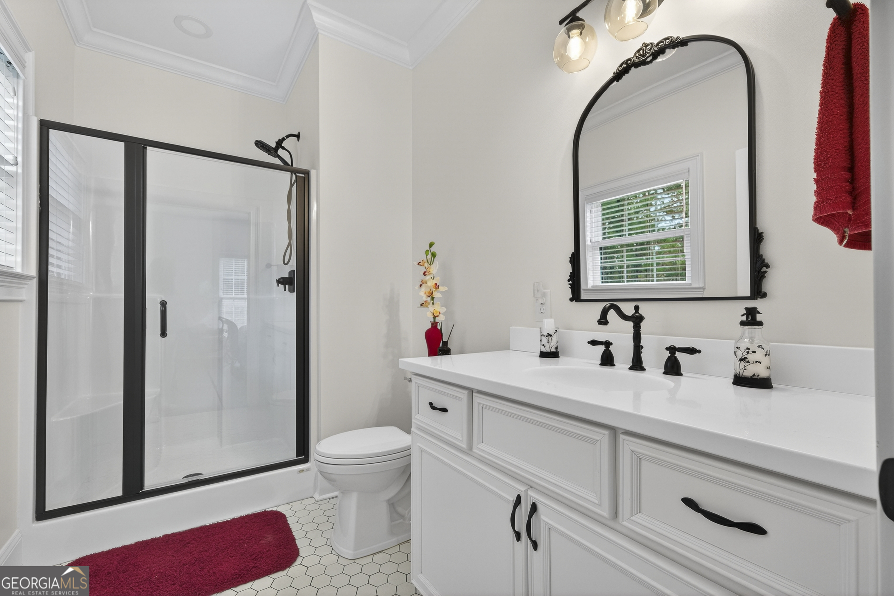 137 Butler Road Southeast Milledgeville, GA 31061 - Photo 52 of 82 a bathroom with a sink toilet and shower