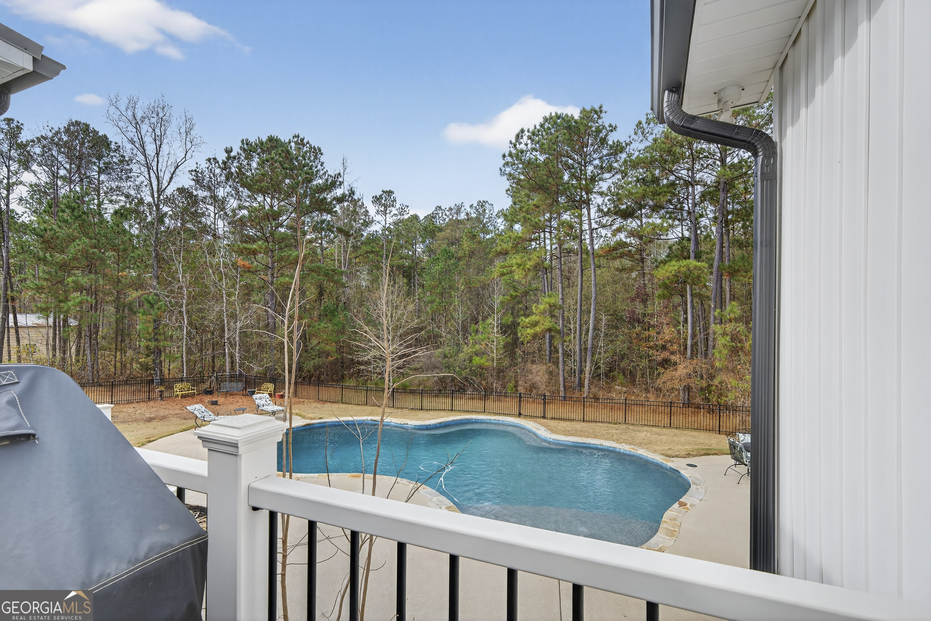 137 Butler Road Southeast Milledgeville, GA 31061 - Photo 58 of 82 a view of a small yard and swimming pool