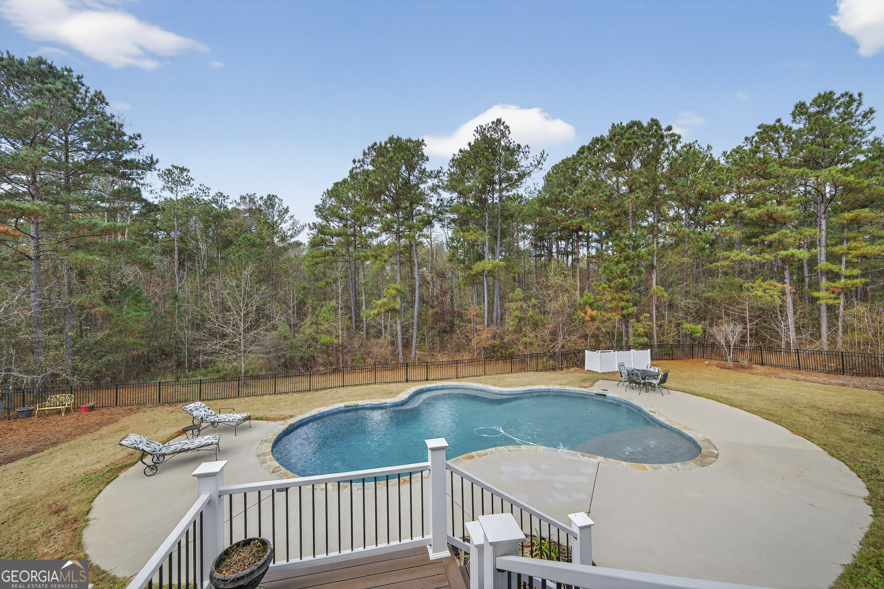 137 Butler Road Southeast Milledgeville, GA 31061 - Photo 59 of 82 a view of a swimming pool with a patio