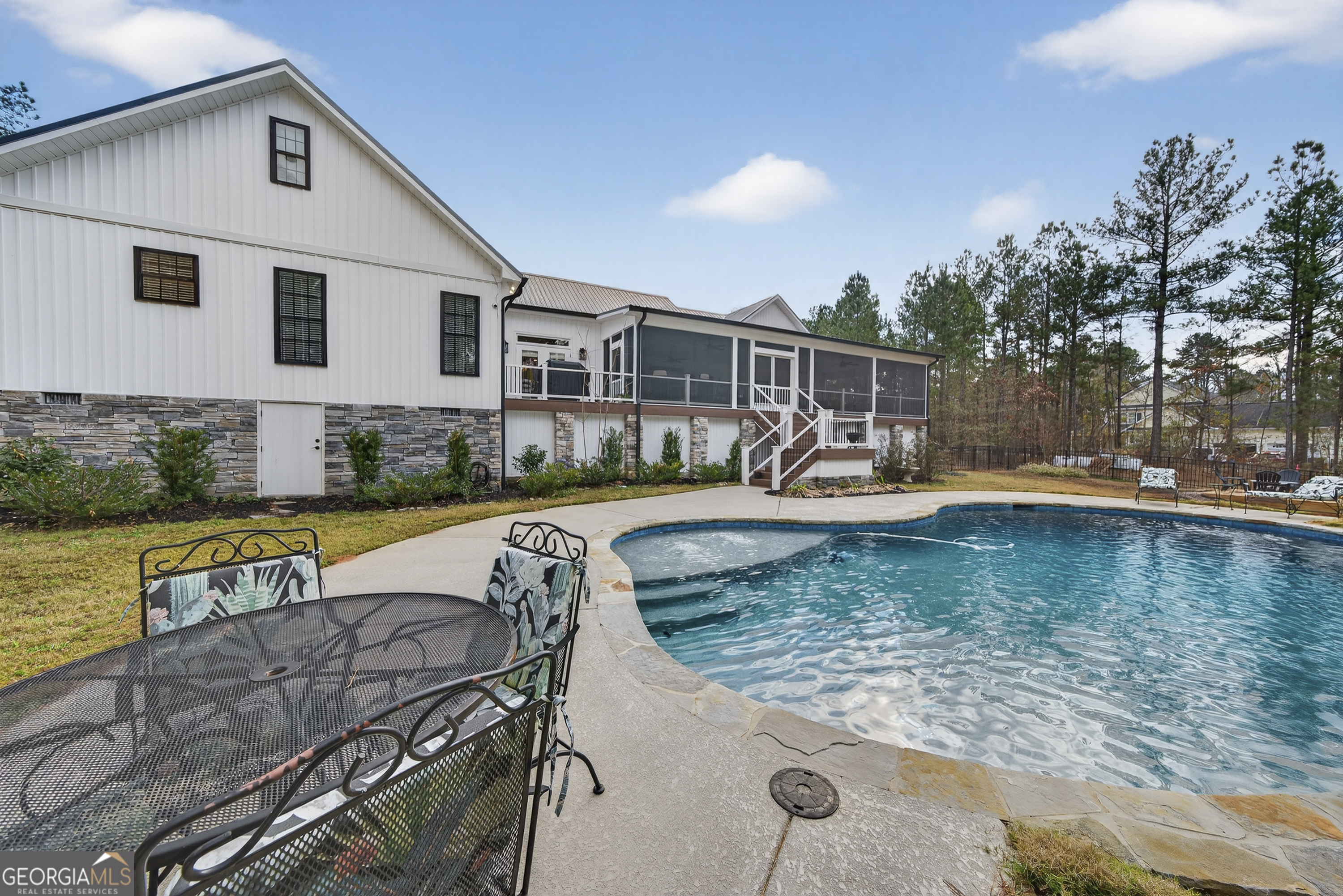 137 Butler Road Southeast Milledgeville, GA 31061 - Photo 63 of 82 a view of a house with swimming pool and sitting area