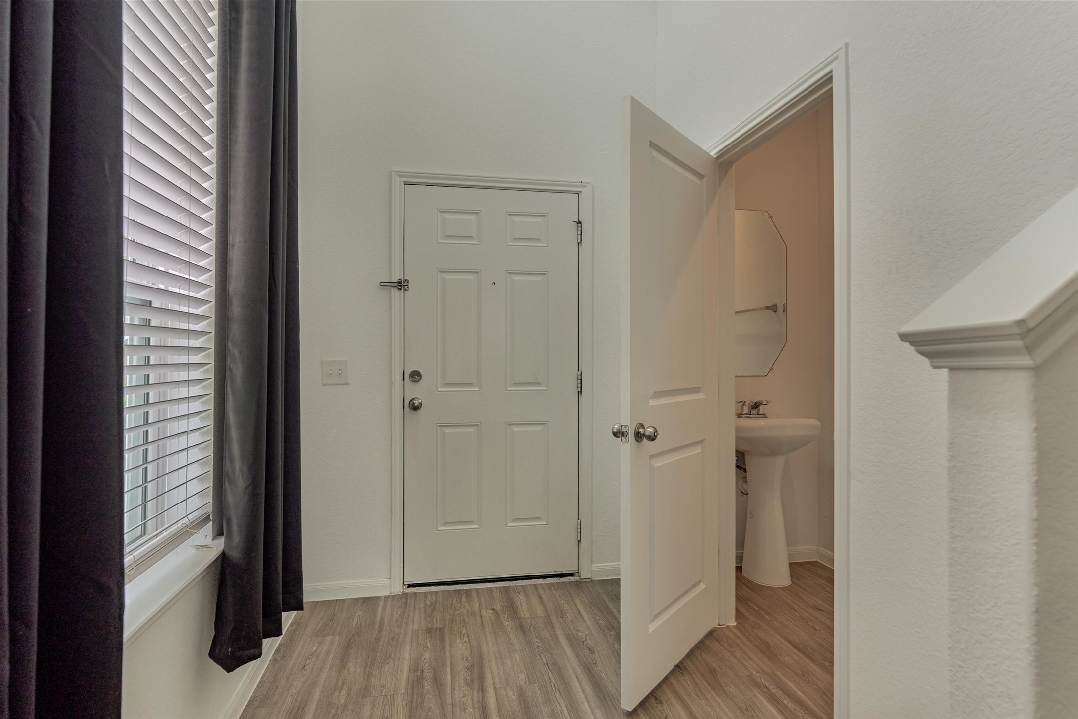 5406 Balerna St Spring Spring, TX 77373 - Photo 4 of 37 Half bath tucked in the front for added privacy