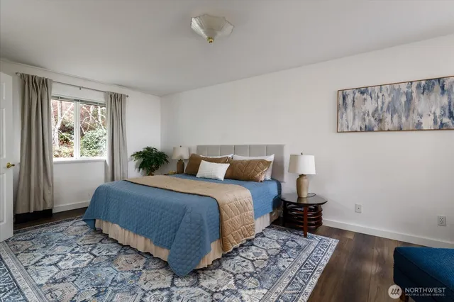 a room with a bed and a window