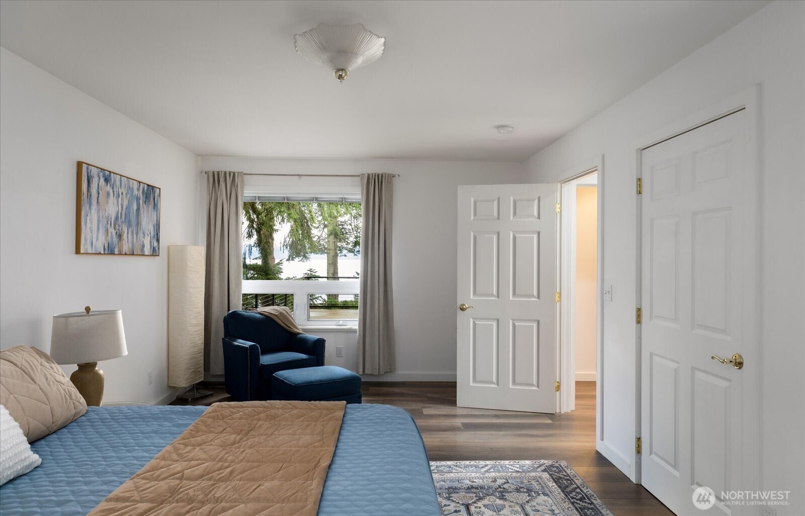 209 East Sara Vista Road Coupeville, WA 98239 - Photo 16 of 40 a bedroom with furniture and a window