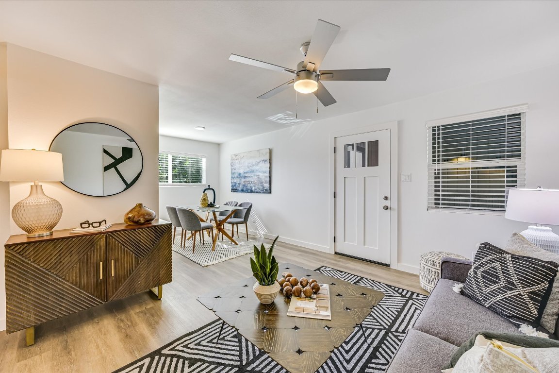 3703 Harmon Avenue, Unit 206 Austin, TX 78705 - Photo 3 of 10 a living room with furniture a rug and a window